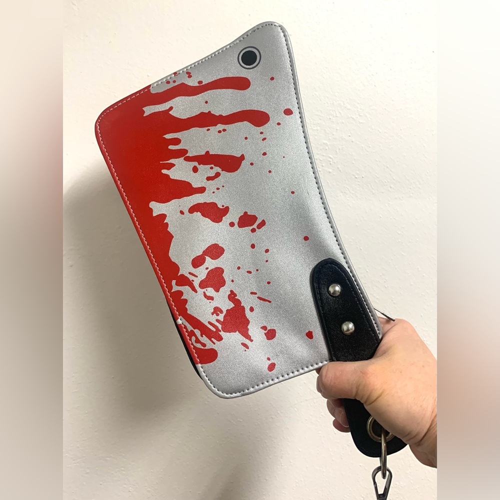 Bloody meat cleaver wristlet